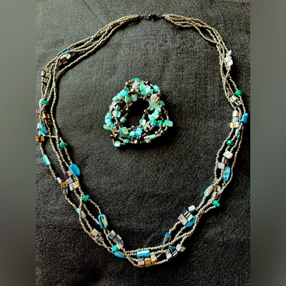 36” 4 strand glass and shell beaded necklace with matching bracelets.